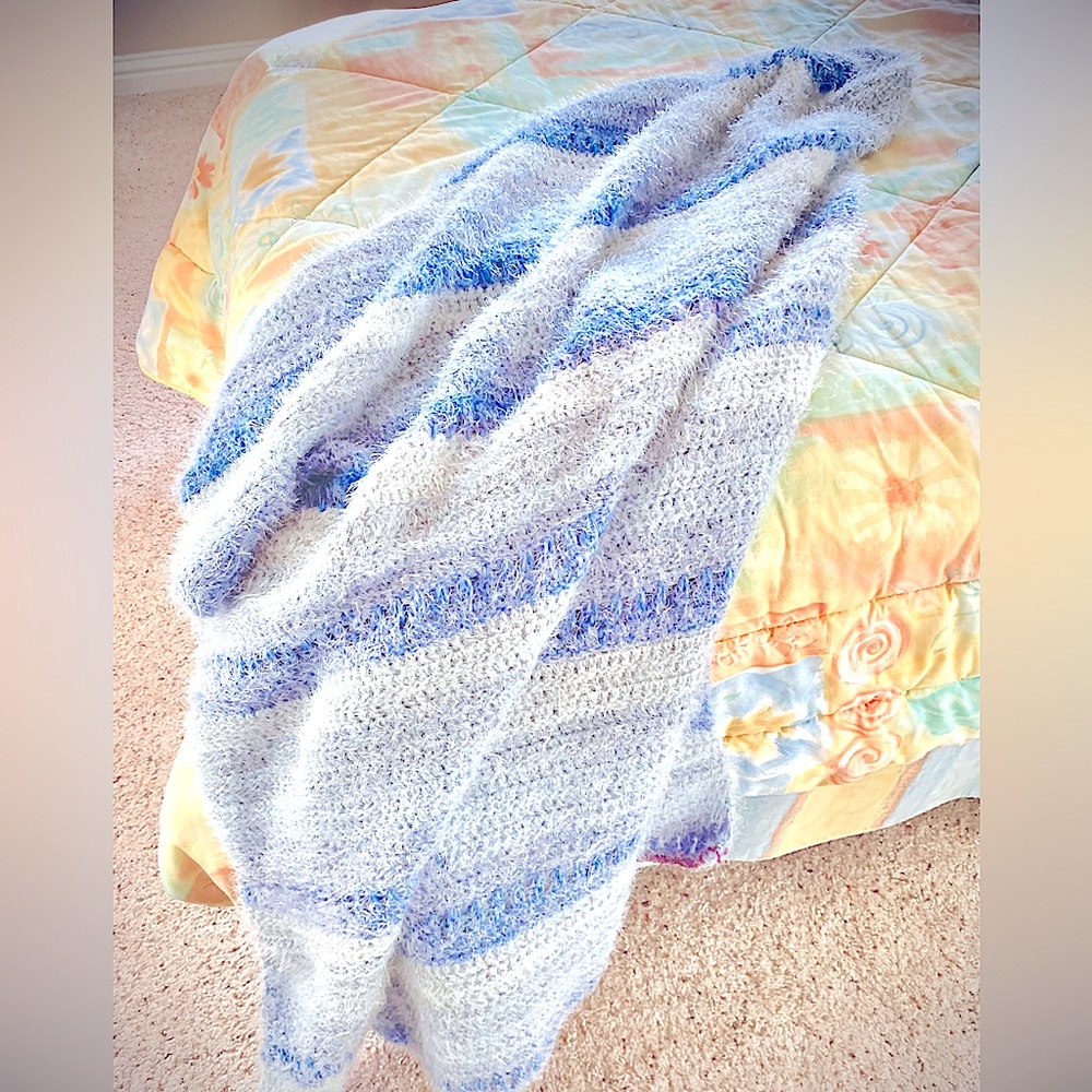 Newly Crochet throw blanket.